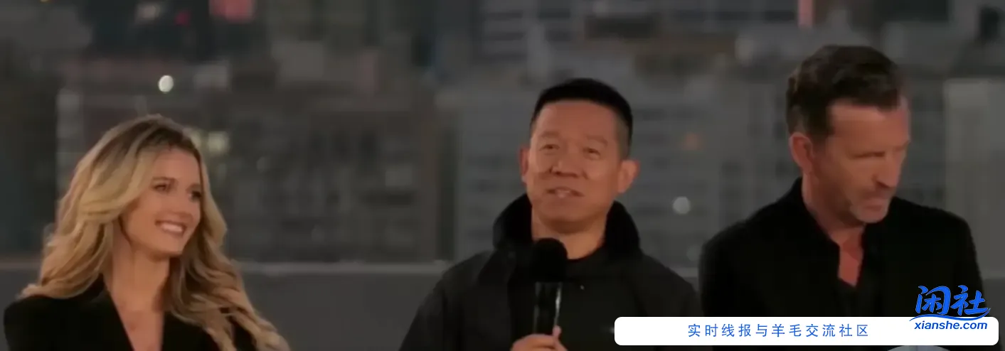 贾跃亭身边的金发妹子很好看啊