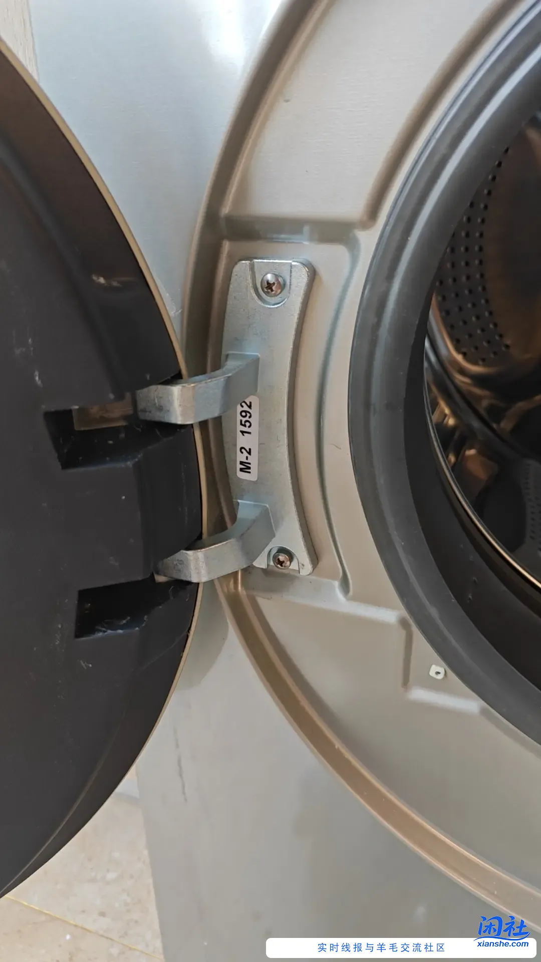 洗衣机门掉下来了，自己修省了300块